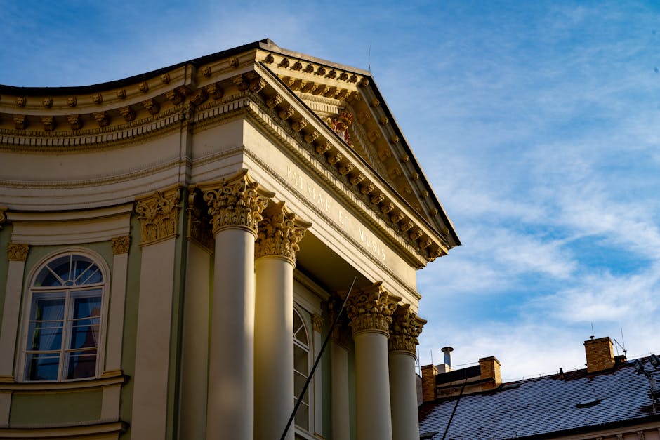 Stunning classic architecture in Prague captured against a vibrant blue sky.