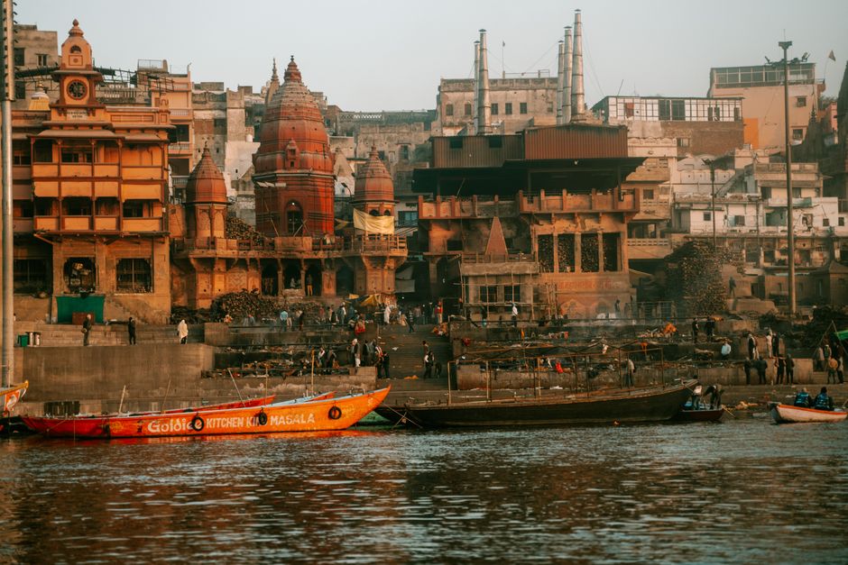 Manikarnika Ghat along the Ganges River in Varanasi, showcasing local architecture and spiritual significance.