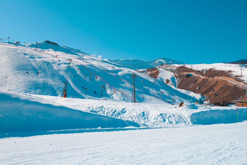 Explore the serene snowy slopes of Baku, Azerbaijan, in this vibrant winter landscape image.