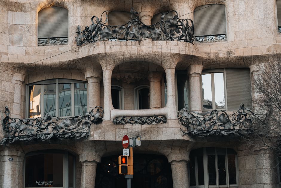 Close-up view of the unique facade of Casa Milà, showcasing Gaudí's artistic and architectural style.